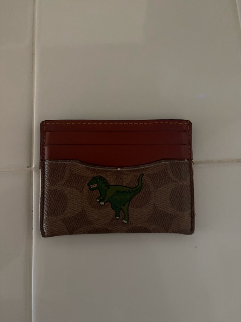 Coach Brown and Red Leather Card Holder with Green Dinosaur